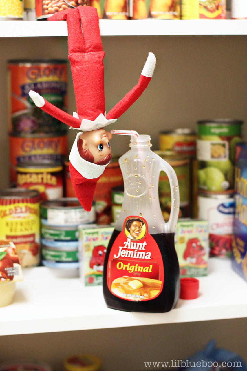Elf on the Shelf Ideas – Drinking Syrup in Pantry