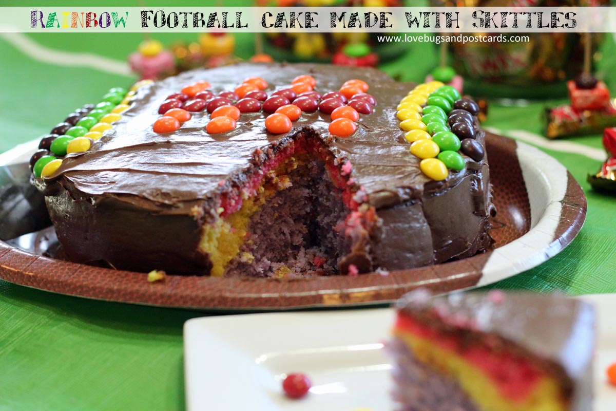 Rainbow football cake made with Skittles for Super Bowl fun #MakeSB50Sweeter